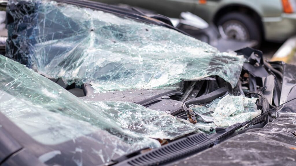 close up of a car with a broken windshield after a fatal crash consequence of a fatal car accident automobile danger reckless dangerous driving vehicle after an accident with a pedestrian